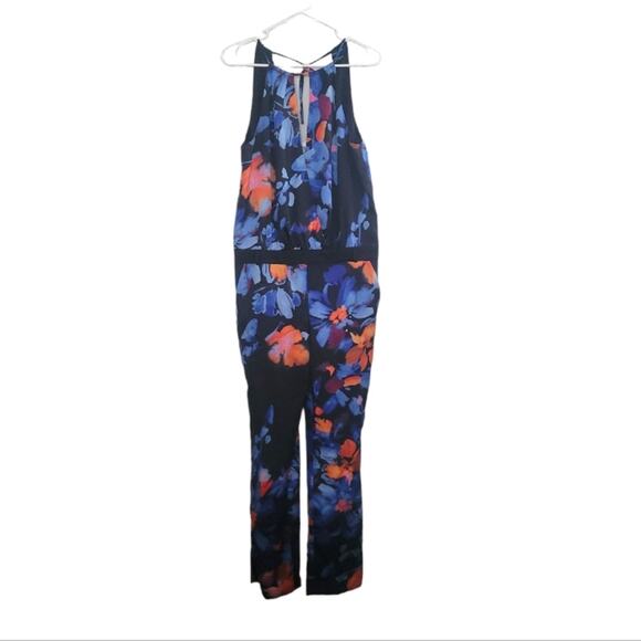 Size 4 Marciano navy blue and orange floral jump suit, deep v front and back - Picture 2 of 7